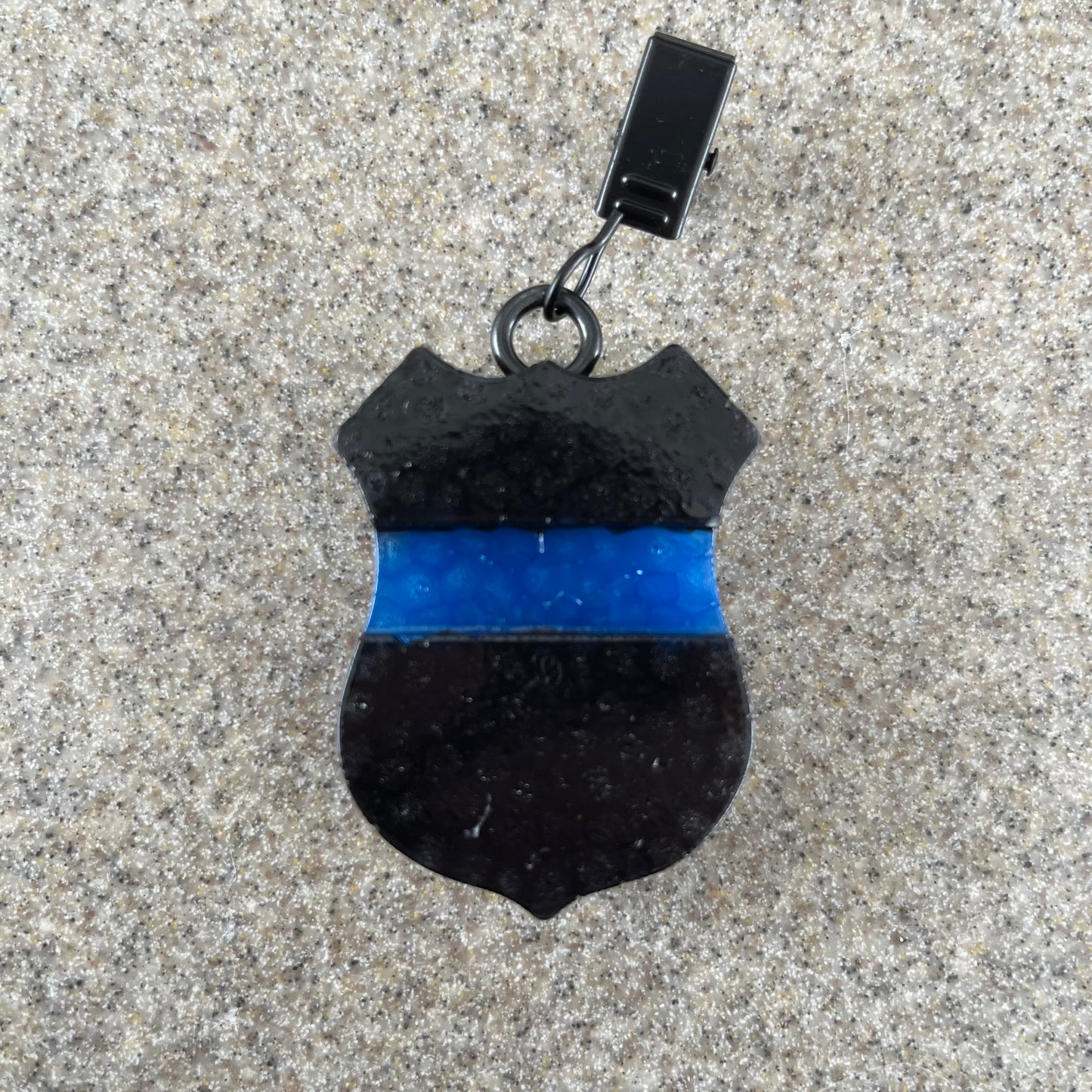 Police badge vent clip