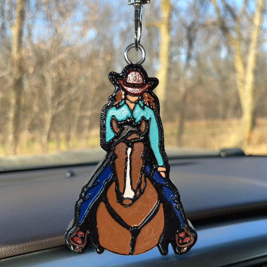 Cowgirl (red head) on horse (bay) Car Freshener